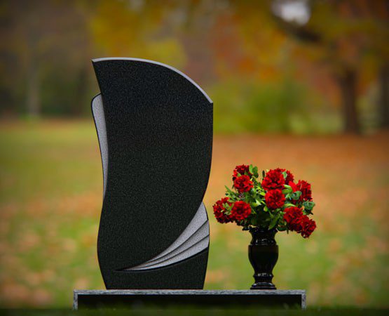 Asymmetrical Upright Memorial with Carved Fold Detail
