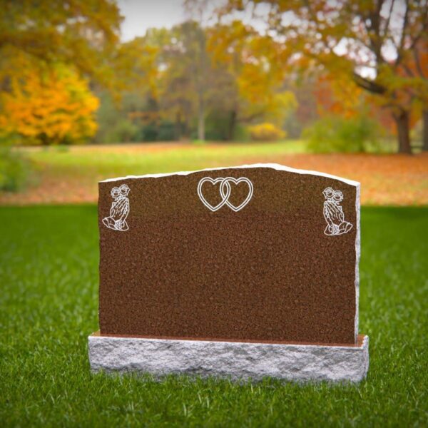 Custom granite headstone with engraved design in cemetery by Memory Stones